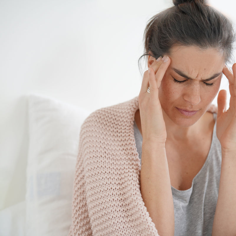 Postpartum Headaches: Are They Normal? Causes and More